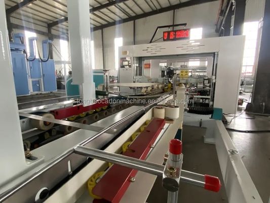 Macchina di incollaggio automatico per la fabbricazione di cartoni