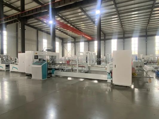 Macchina di incollaggio automatico per la fabbricazione di cartoni
