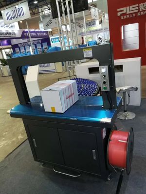 Imballaggio ad alto volume reso facile con la macchina di fasciatura automatica a pressione superiore